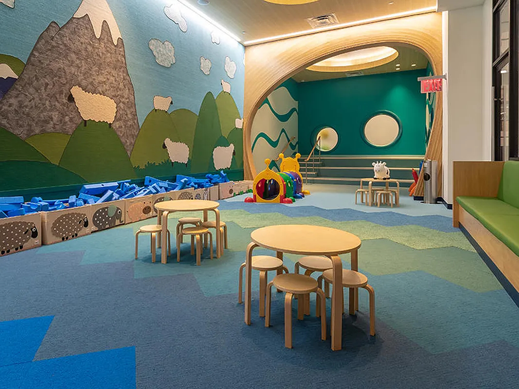606 West 57th Street, Unit 1612 Manhattan, NY 10019 - Photo 16 of 18 a dining room with furniture and a rug