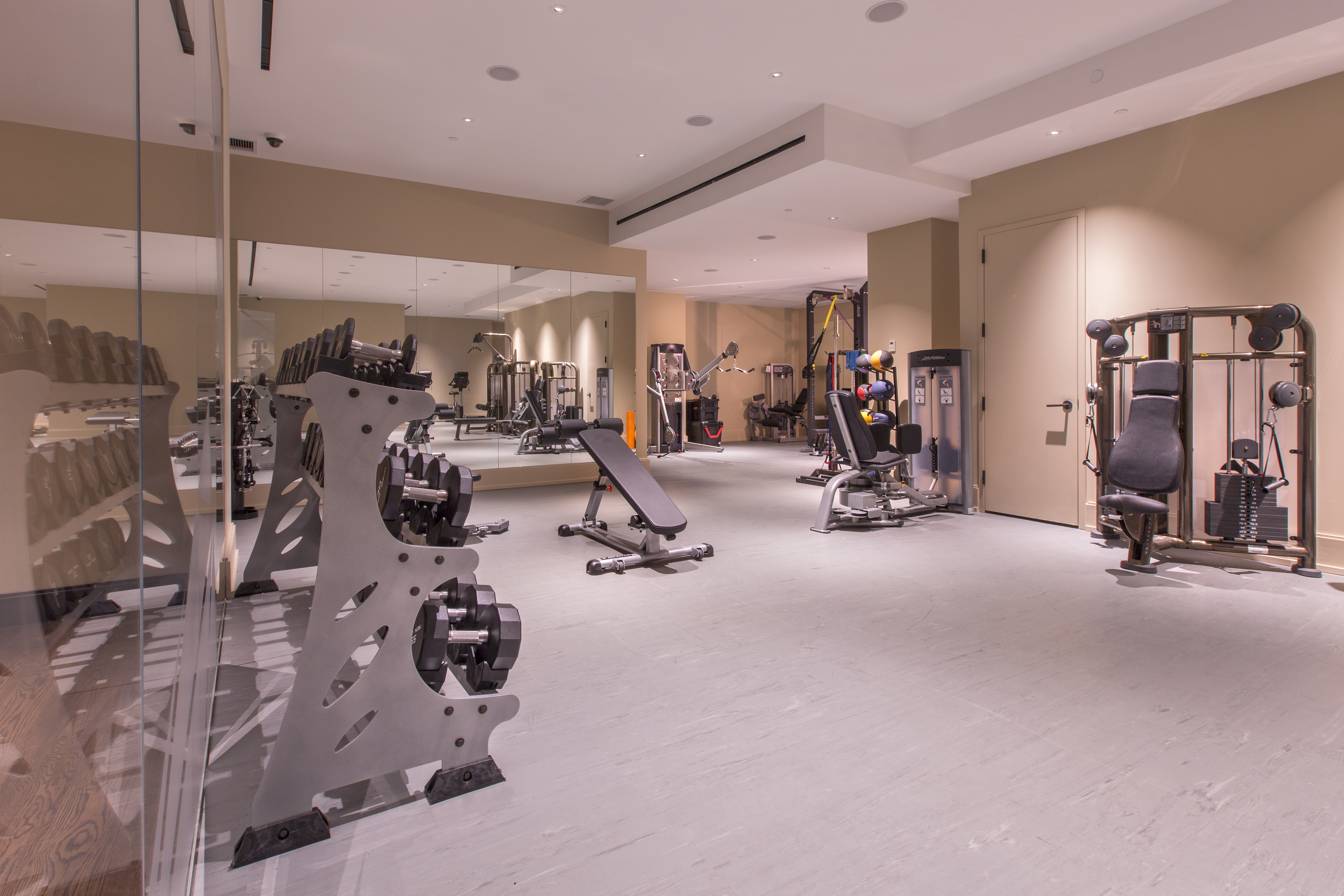212 West 18th Street, Unit 19C Manhattan, NY 10011 - Photo 24 of 27 a view of a room with gym equipment