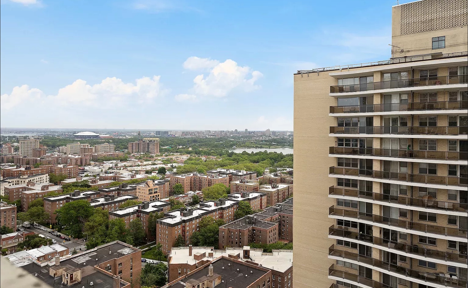 102-10 66th Road, Unit 21K Queens, NY 11375 - Photo 10 of 16 a view of a city with tall buildings