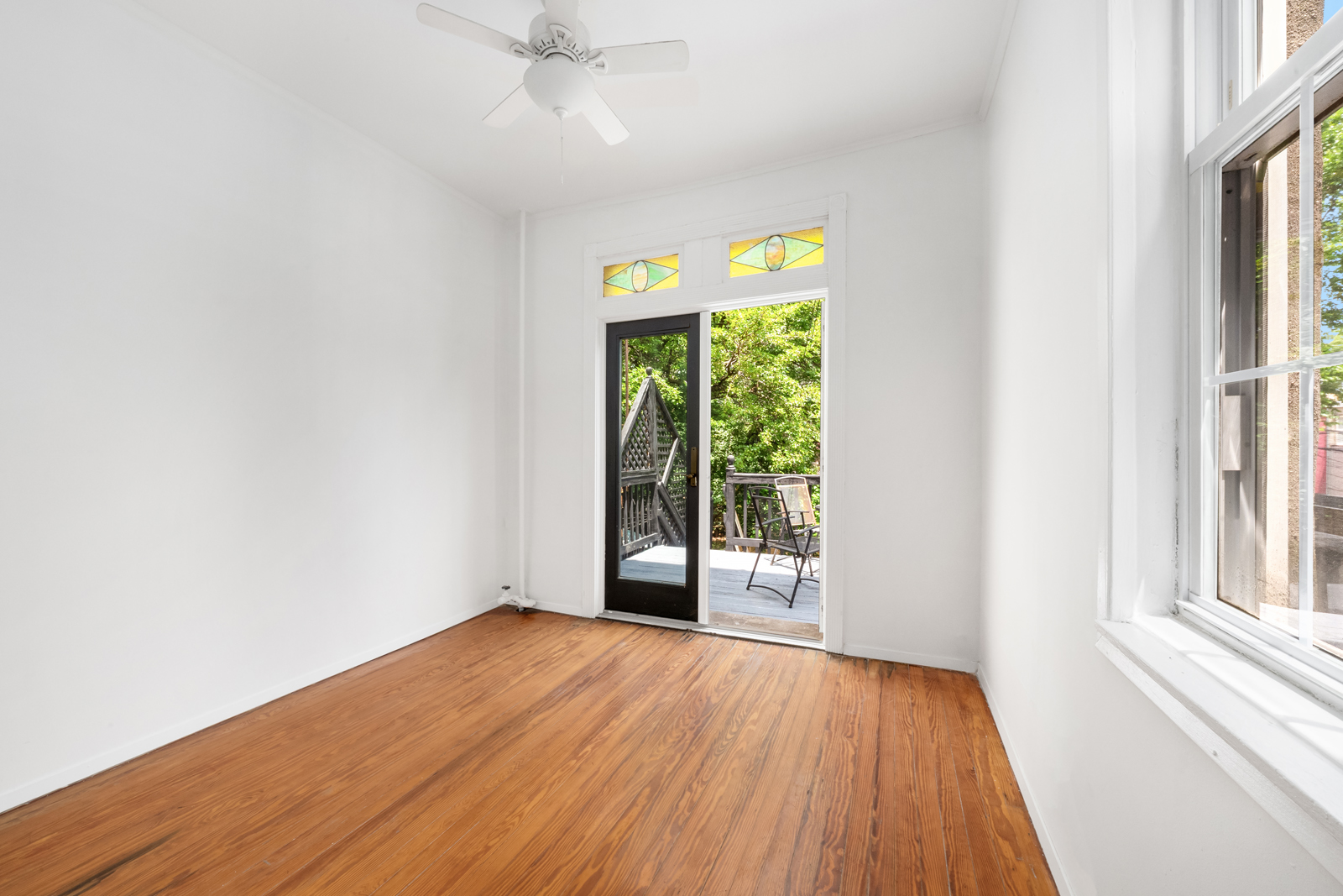 441 Union Street, Unit 2 Brooklyn, NY 11231 - Photo 4 of 11 wooden floor in an empty room with a window