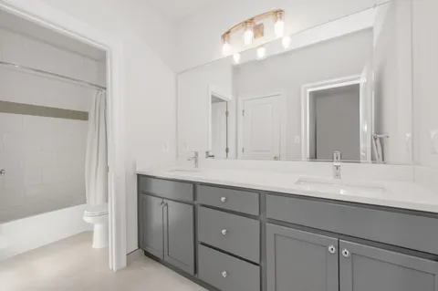 a view of a backyard with a tree