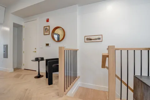 a view of a hallway with entryway