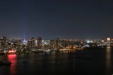 a view of a city with tall buildings