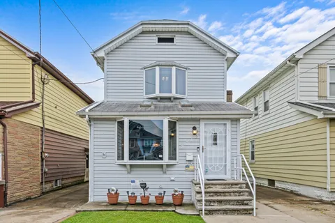 a front view of house with yard