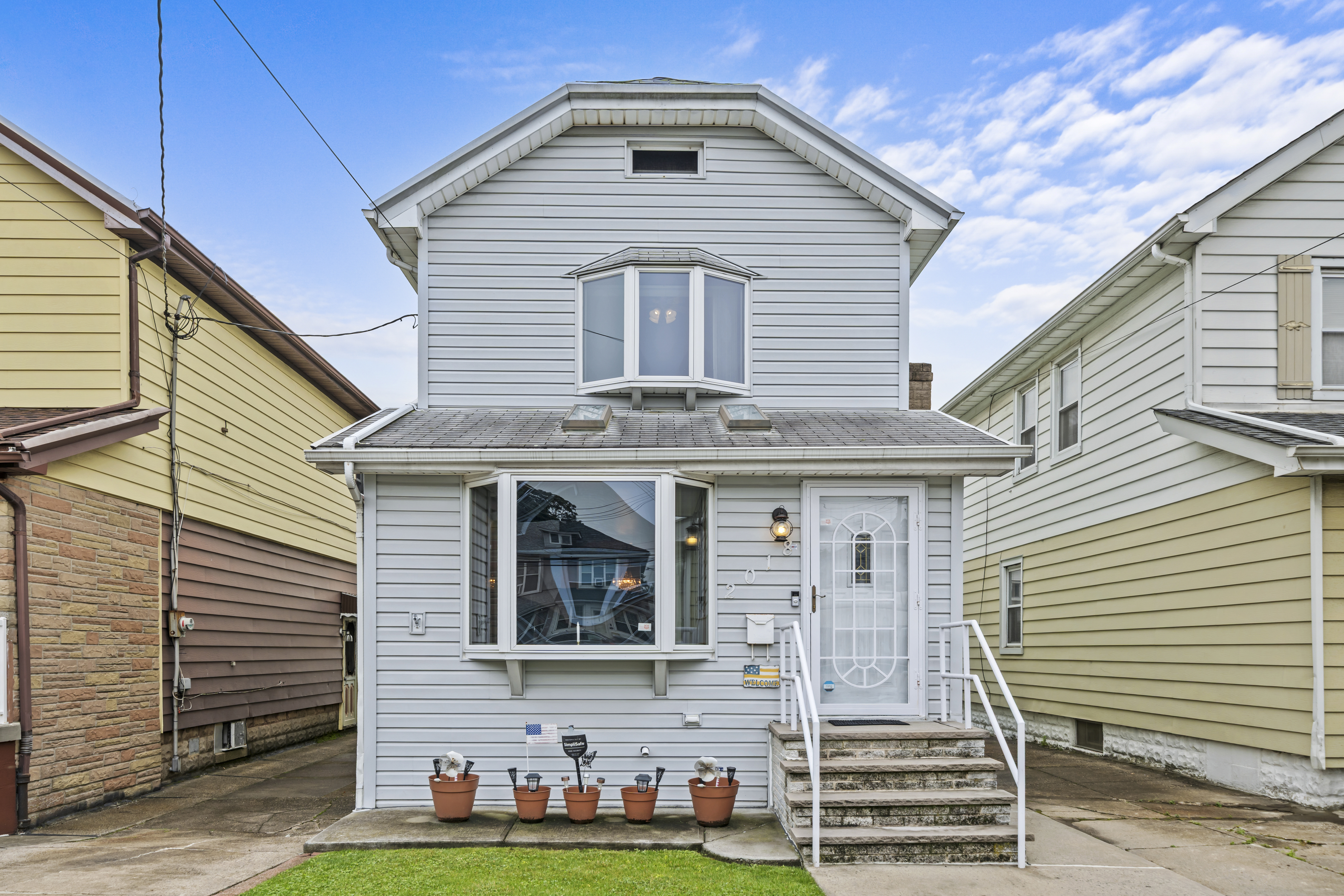 2018 Mill Avenue Brooklyn, NY 11234 - Photo 2 of 20 a front view of house with yard