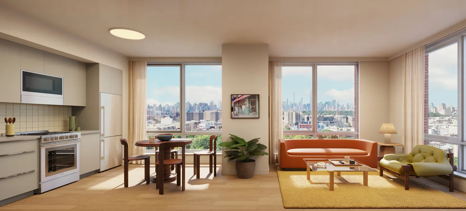 a living room with furniture a fireplace and a large window