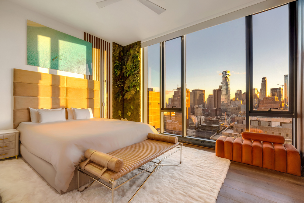 570 Broome Street, Unit PHB Manhattan, NY 10013 - Photo 9 of 23 a bedroom with a large bed and a large window