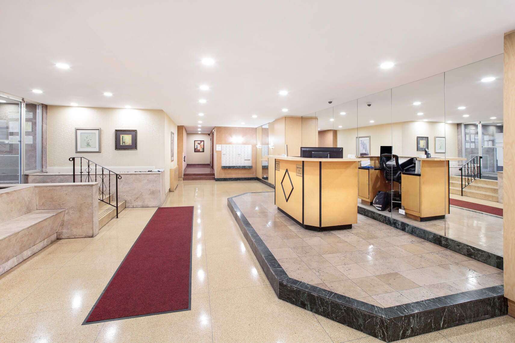 9801 Shore Road, Unit 2B Brooklyn, NY 11209 - Photo 9 of 13 a large kitchen with stainless steel appliances granite countertop a large counter top and a view of living room