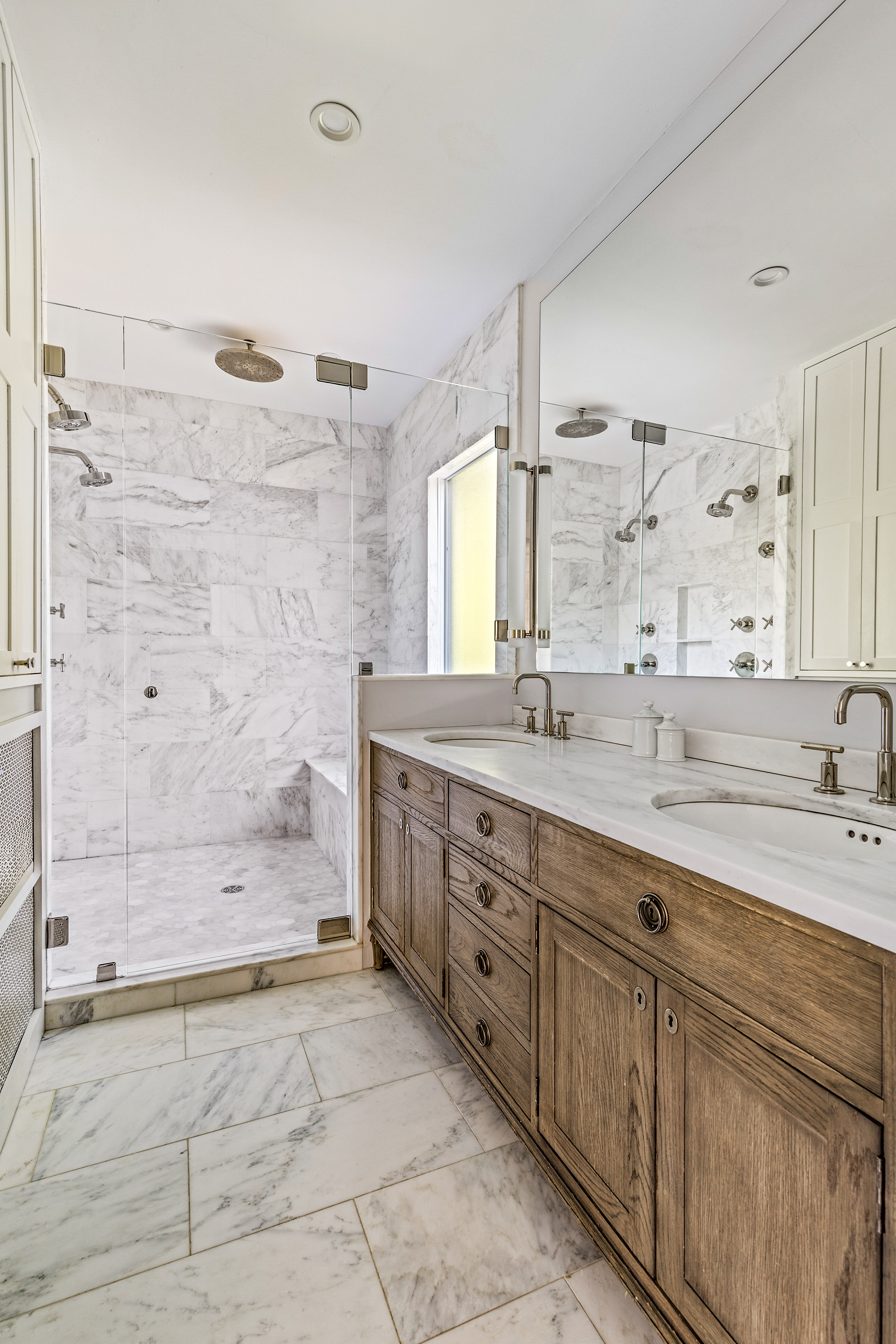 689 East 17th Street Brooklyn, NY 11230 - Photo 16 of 28 a bathroom with a granite countertop sink mirror and shower