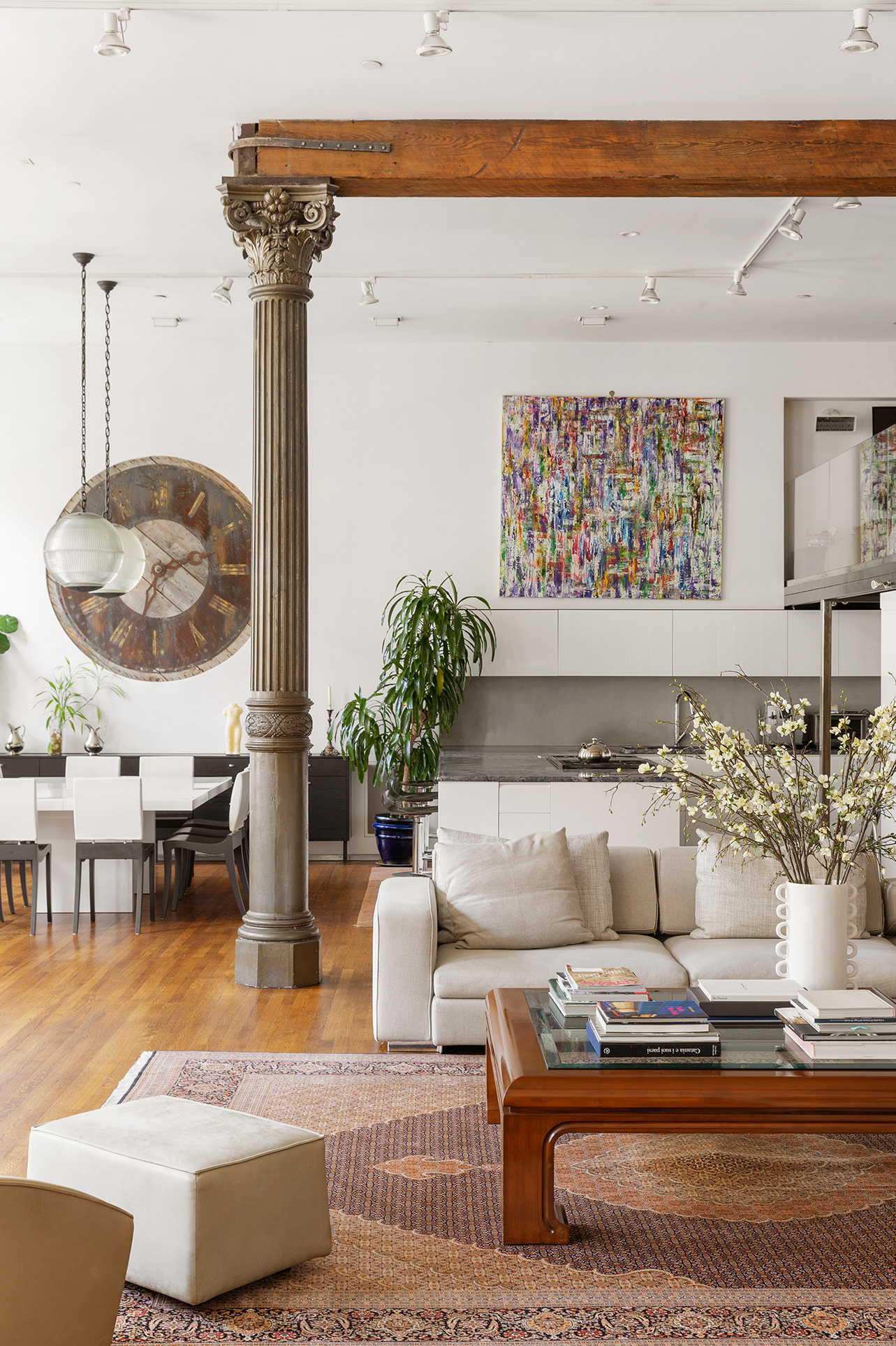 84 Mercer Street, Unit 3E Manhattan, NY 10012 - Photo 3 of 19 a living room with furniture and a potted plant