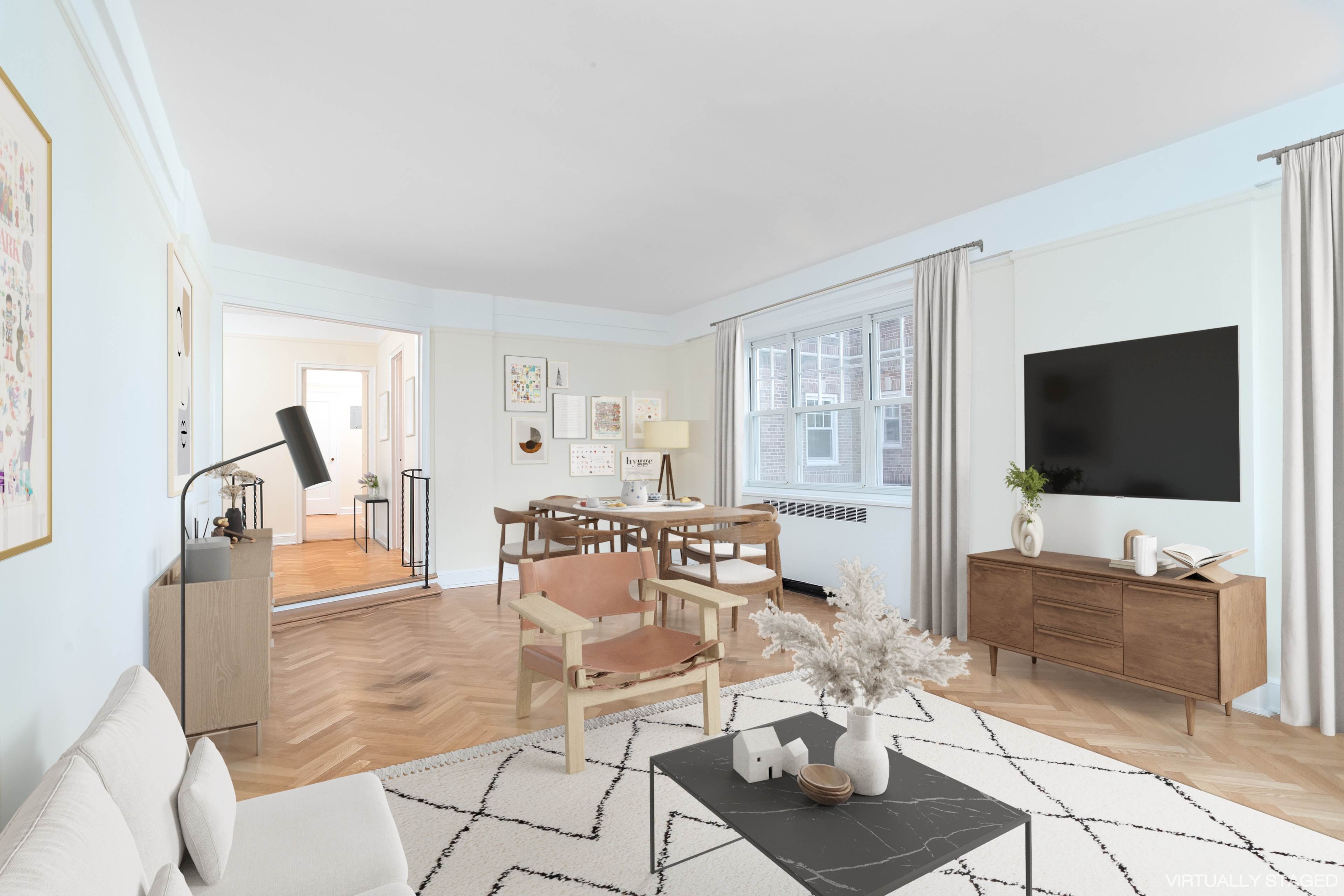 180 Cabrini Boulevard, Unit 37 Manhattan, NY 10033 - Photo 6 of 35 a living room with furniture a flat screen tv and a floor to ceiling window