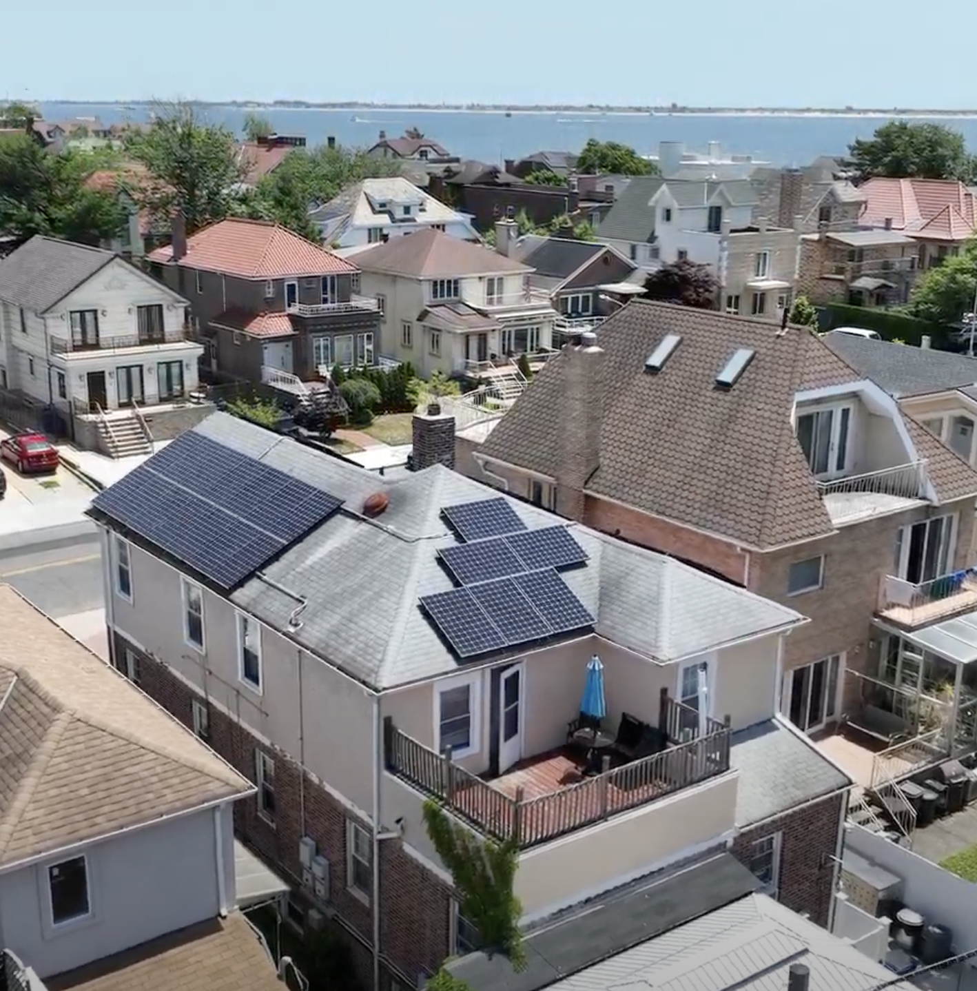 238 West End Avenue Brooklyn, NY 11235 - Photo 2 of 13 an aerial view of multiple houses with a city