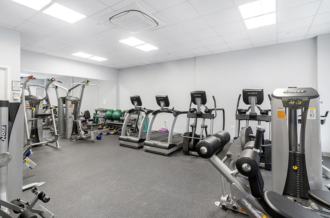 26 Broadway, Unit 402 Brooklyn, NY 11249 - Photo 15 of 17 a view of a room with gym equipment