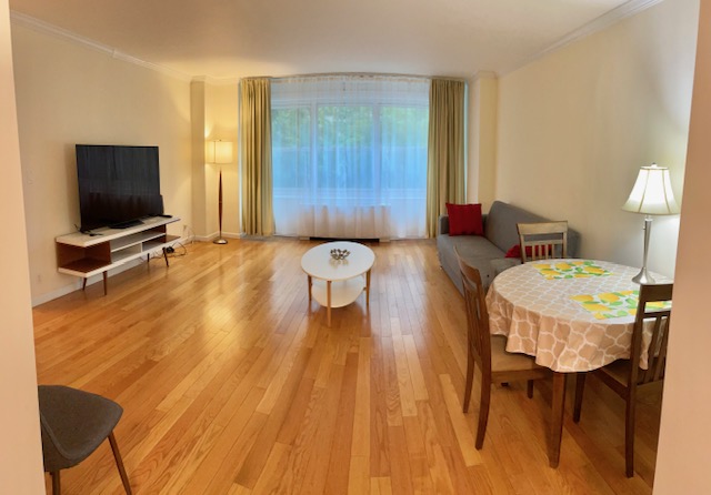 150 West End Avenue, Unit 2G Manhattan, NY 10023 - Photo 2 of 10 a view of a dining room with furniture and wooden floor