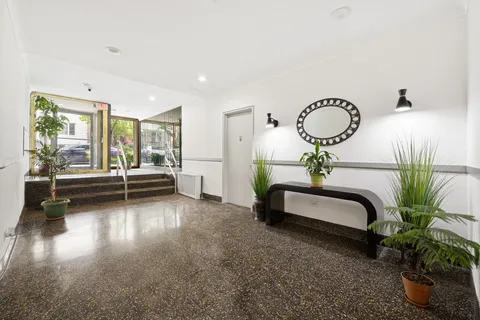 a view of room with furniture and rug