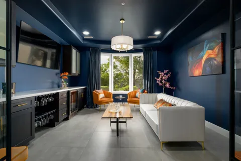 a spacious bathroom with a double vanity sink mirror and double