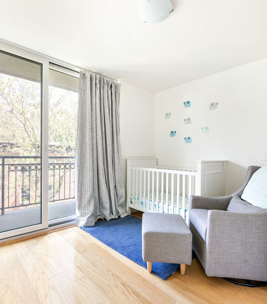 52 Dean Street, Unit 4A Brooklyn, NY 11201 - Photo 5 of 7 a living room with furniture and a large window