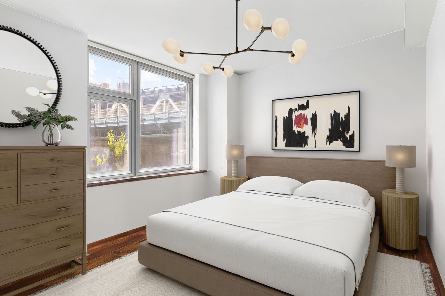 a bedroom with a bed and a painting on the wall