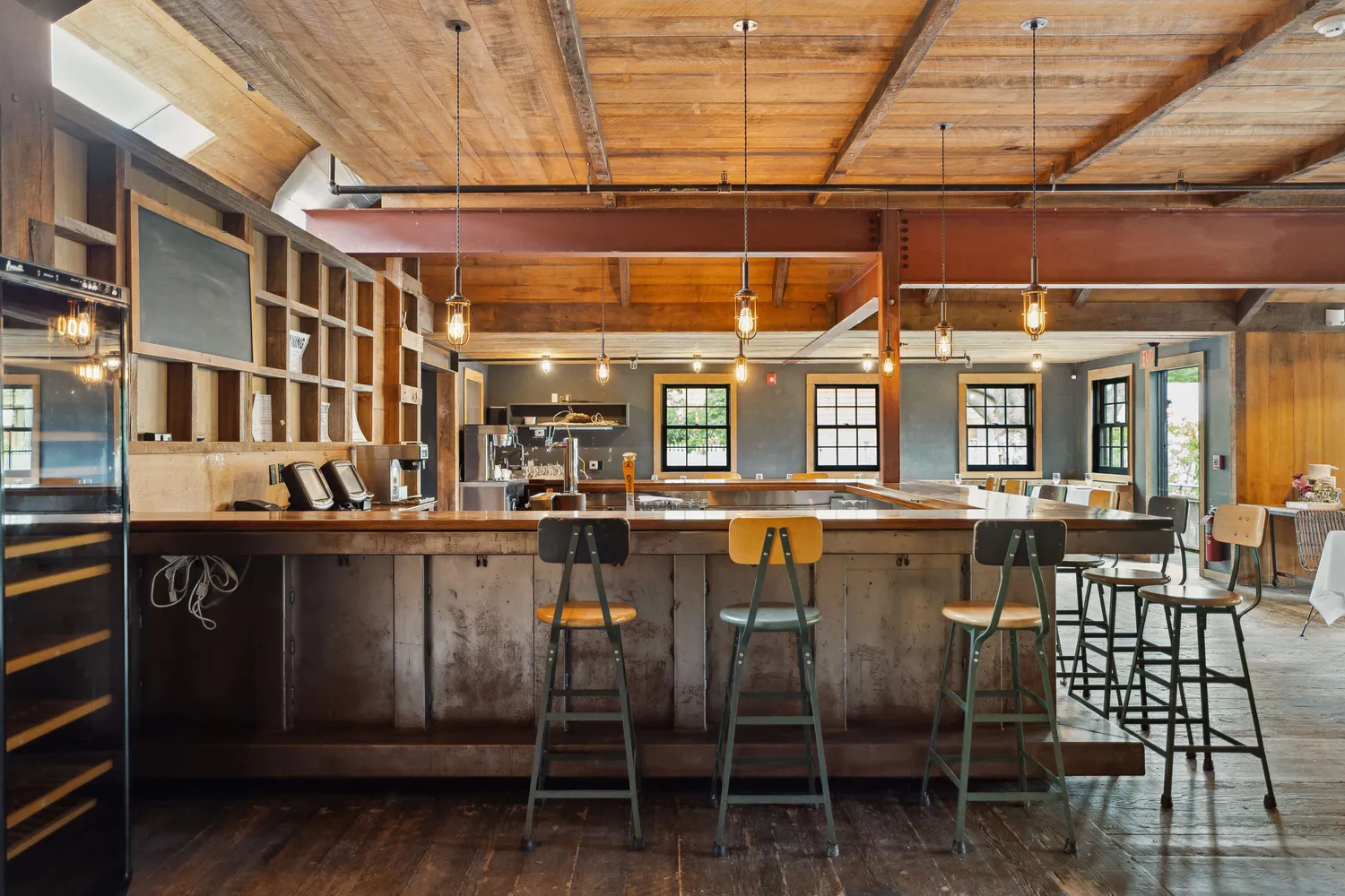 a view of a chairs and table in a room