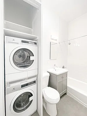 1736 2nd Avenue, Unit C Manhattan, NY 10128 - Photo 4 of 4 a bathroom with a sink a toilet and a bathtub