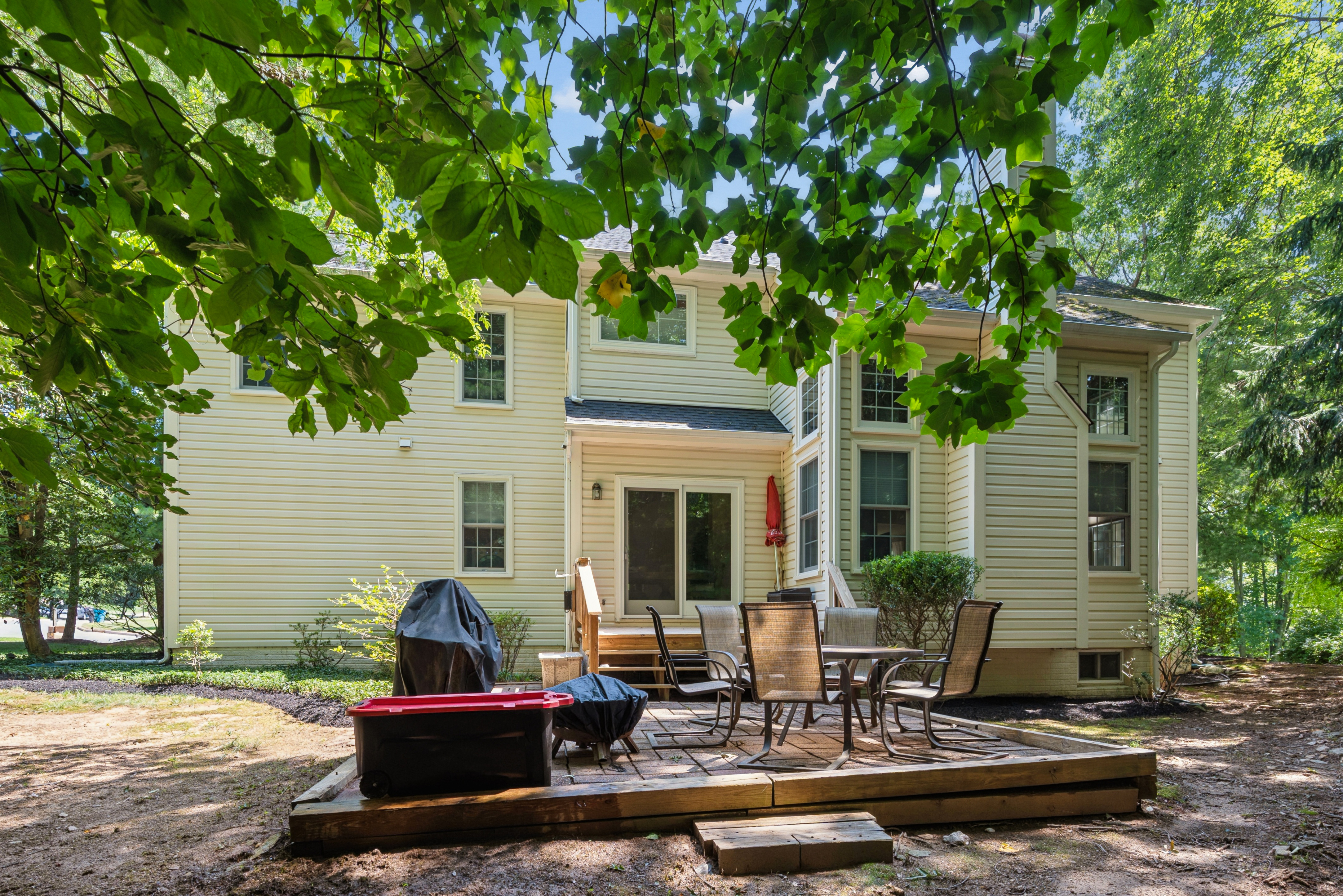 18710 Severn Road Gaithersburg, MD 20879 - Photo 84 of 96 a view of a house with backyard sitting area and garden