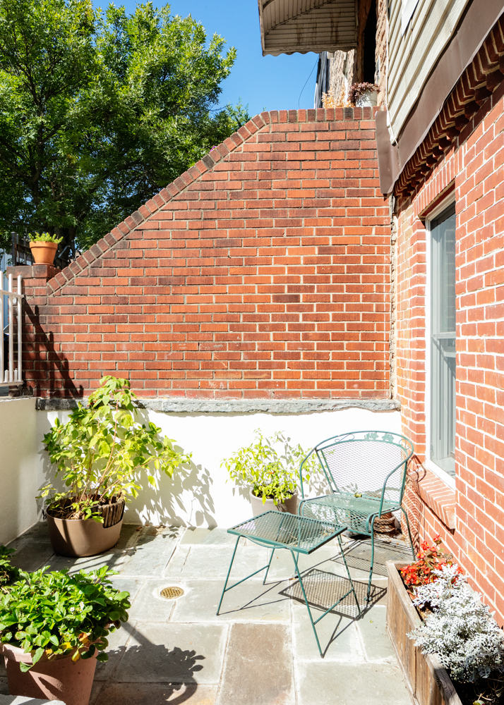 333 Prospect Avenue, Unit G Brooklyn, NY 11215 - Photo 7 of 8 a patio with table and chairs and potted plants