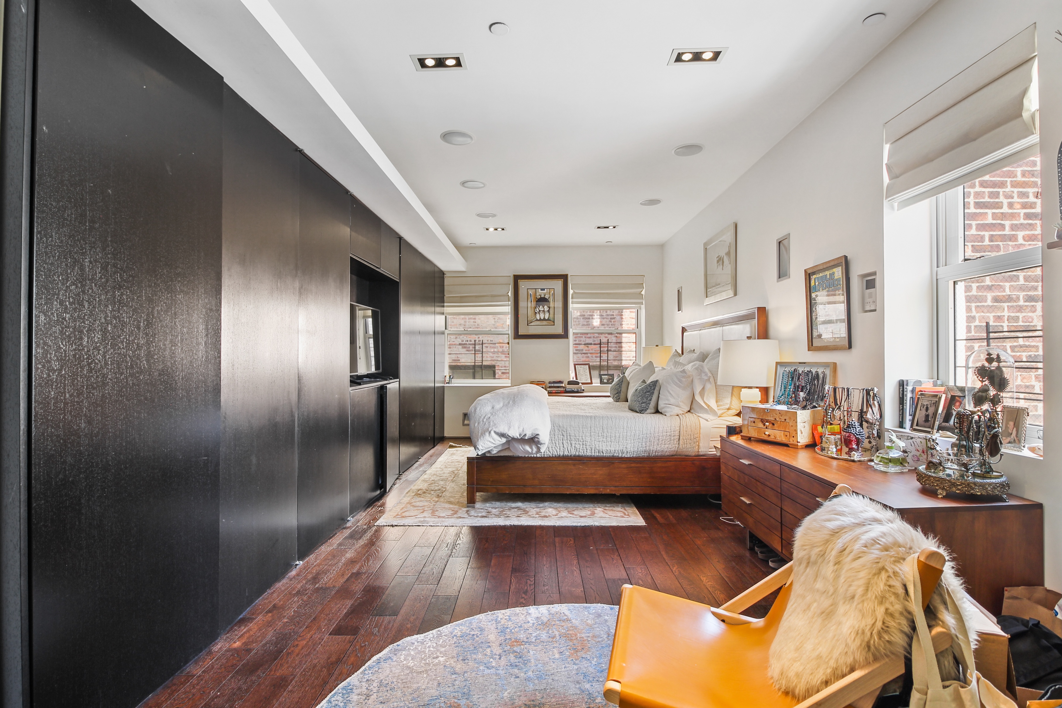 405 Broadway, Unit 4 Manhattan, NY 10013 - Photo 10 of 19 a living room with furniture and a large window