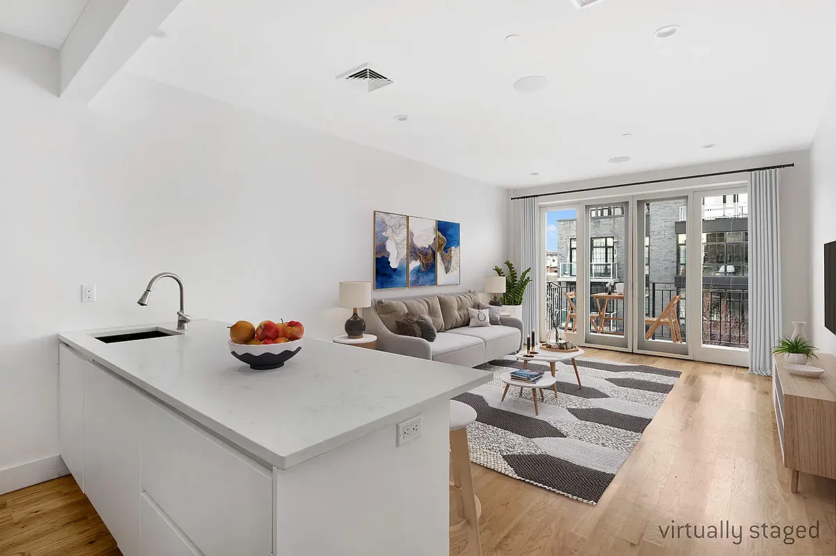 18 A Bleecker Street, Unit 2B Brooklyn, NY 11221 - Photo 2 of 14 a living room with furniture and a floor to ceiling window
