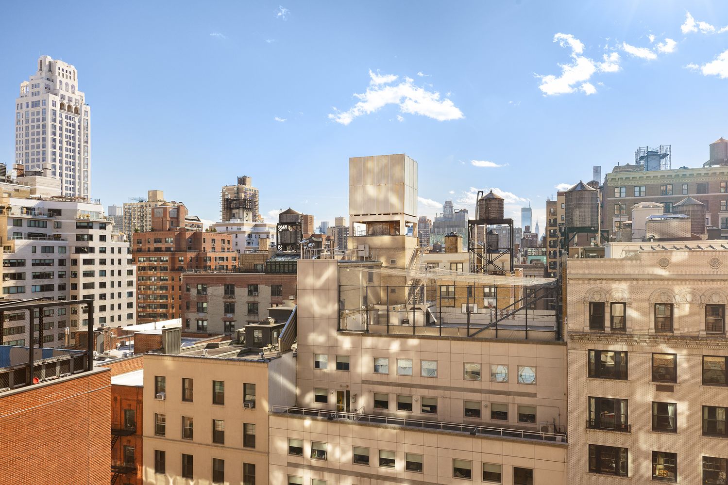 a view of a city that has tall building