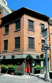 a front view of a building with retail street