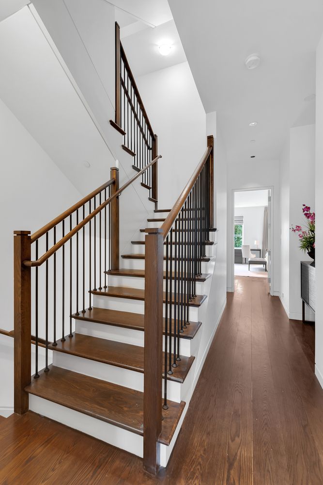 42 West 71st Street Manhattan, NY 10023 - Photo 8 of 35 a view of staircase with wooden floor and a rug