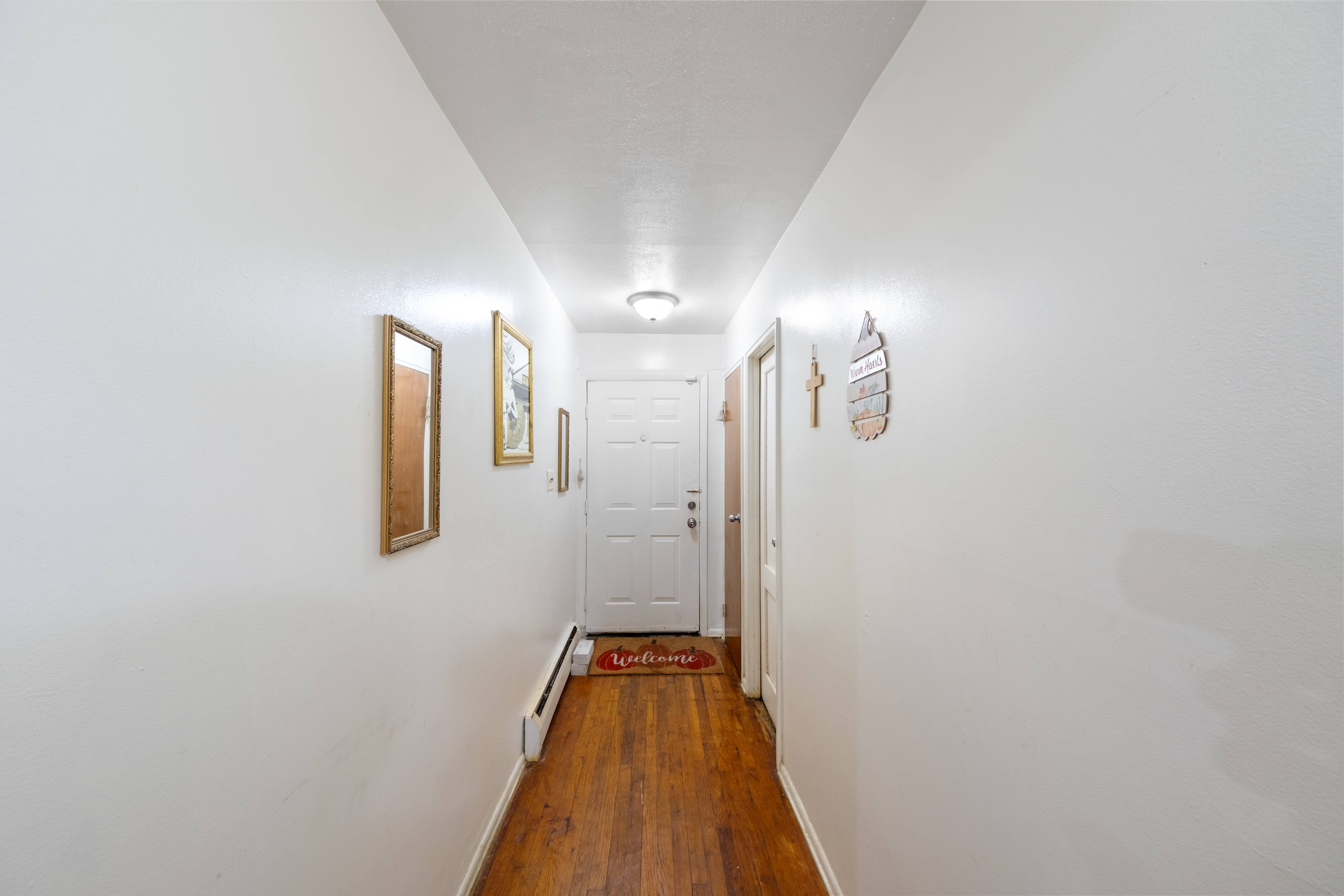 1464 East 84th Street Brooklyn, NY 11236 - Photo 12 of 22 a bathroom with a bathtub and shower