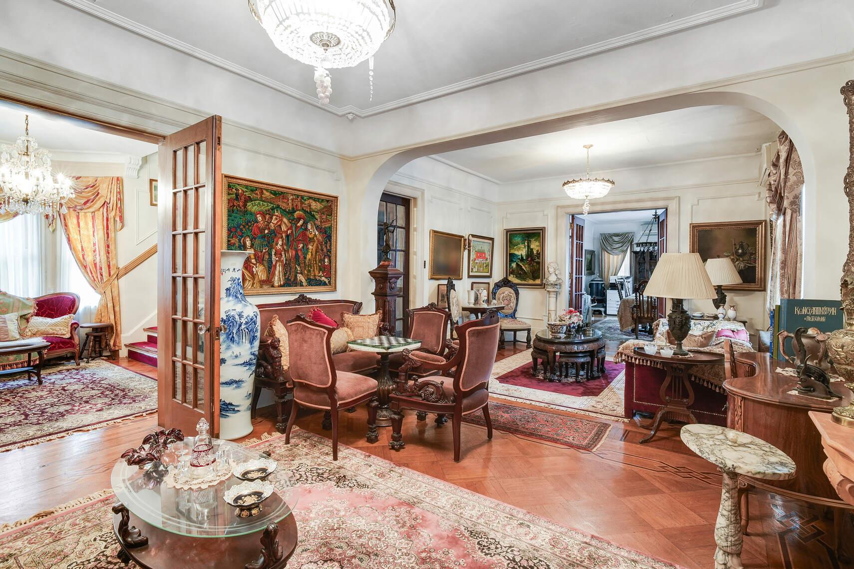 240 76th Street Brooklyn, NY 11209 - Photo 2 of 9 a living room with furniture and a large window