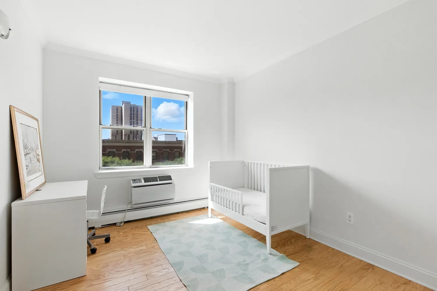 a living room with furniture and windows