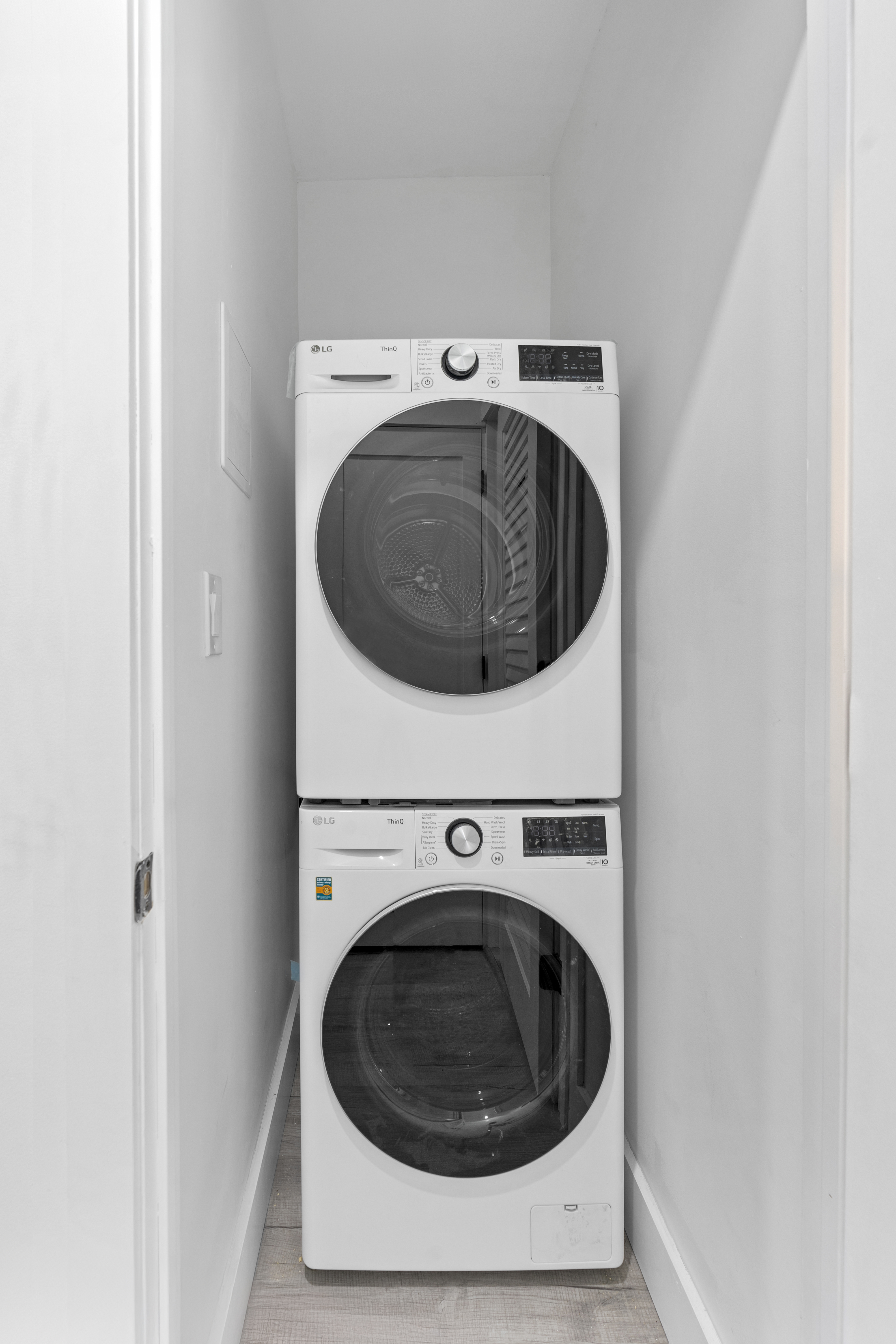 714 Greenwich Street, Unit 8 Manhattan, NY 10014 - Photo 7 of 7 a utility room with dryer and washer