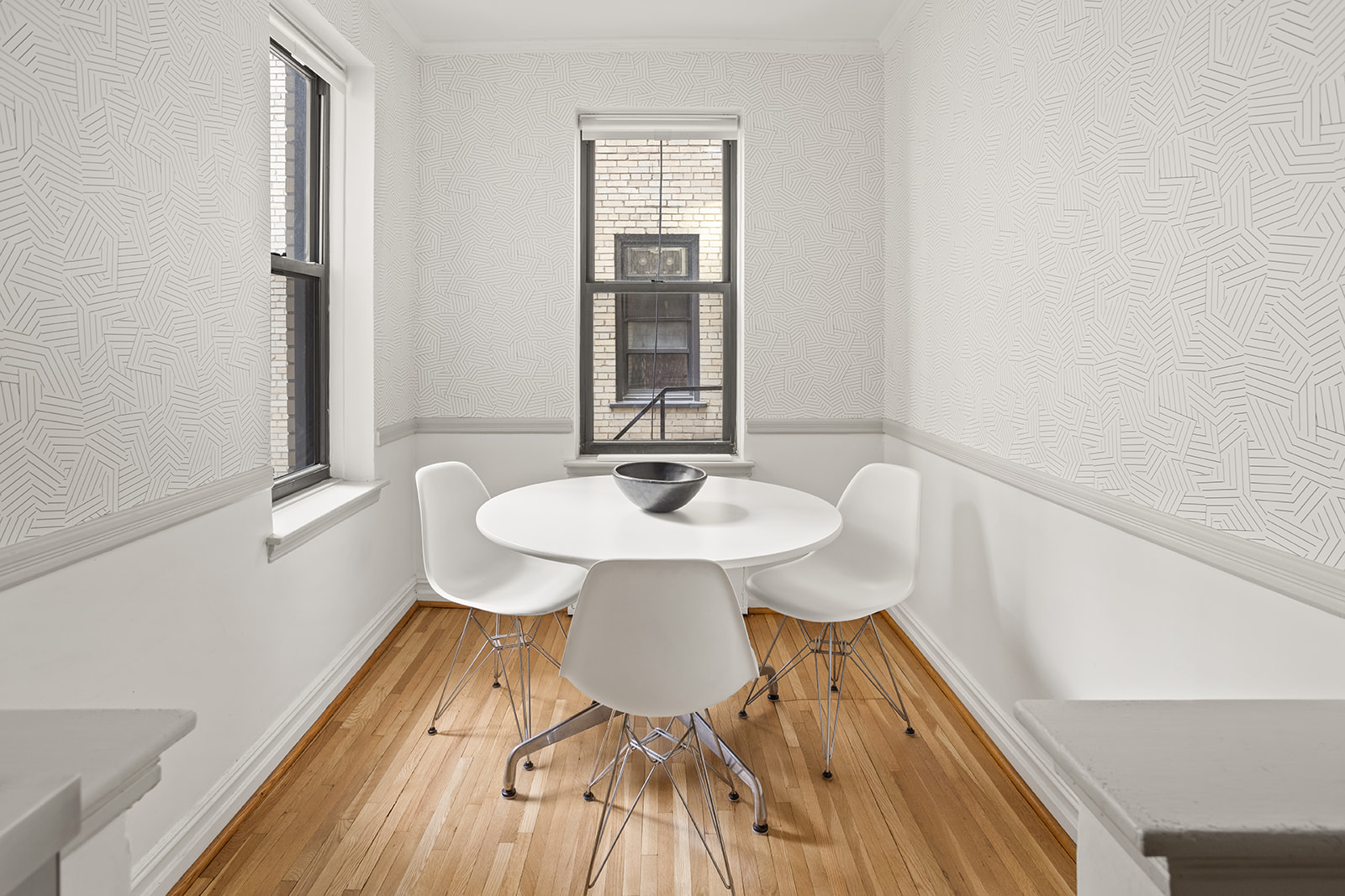 35-36 76th Street, Unit 123 Queens, NY 11372 - Photo 3 of 11 a view of a dining room with furniture and wooden floor
