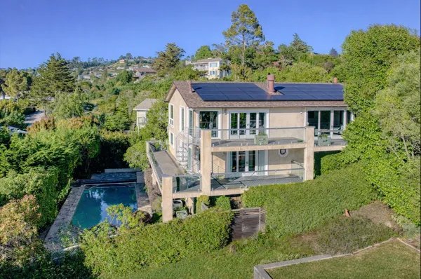 a house view with a garden space