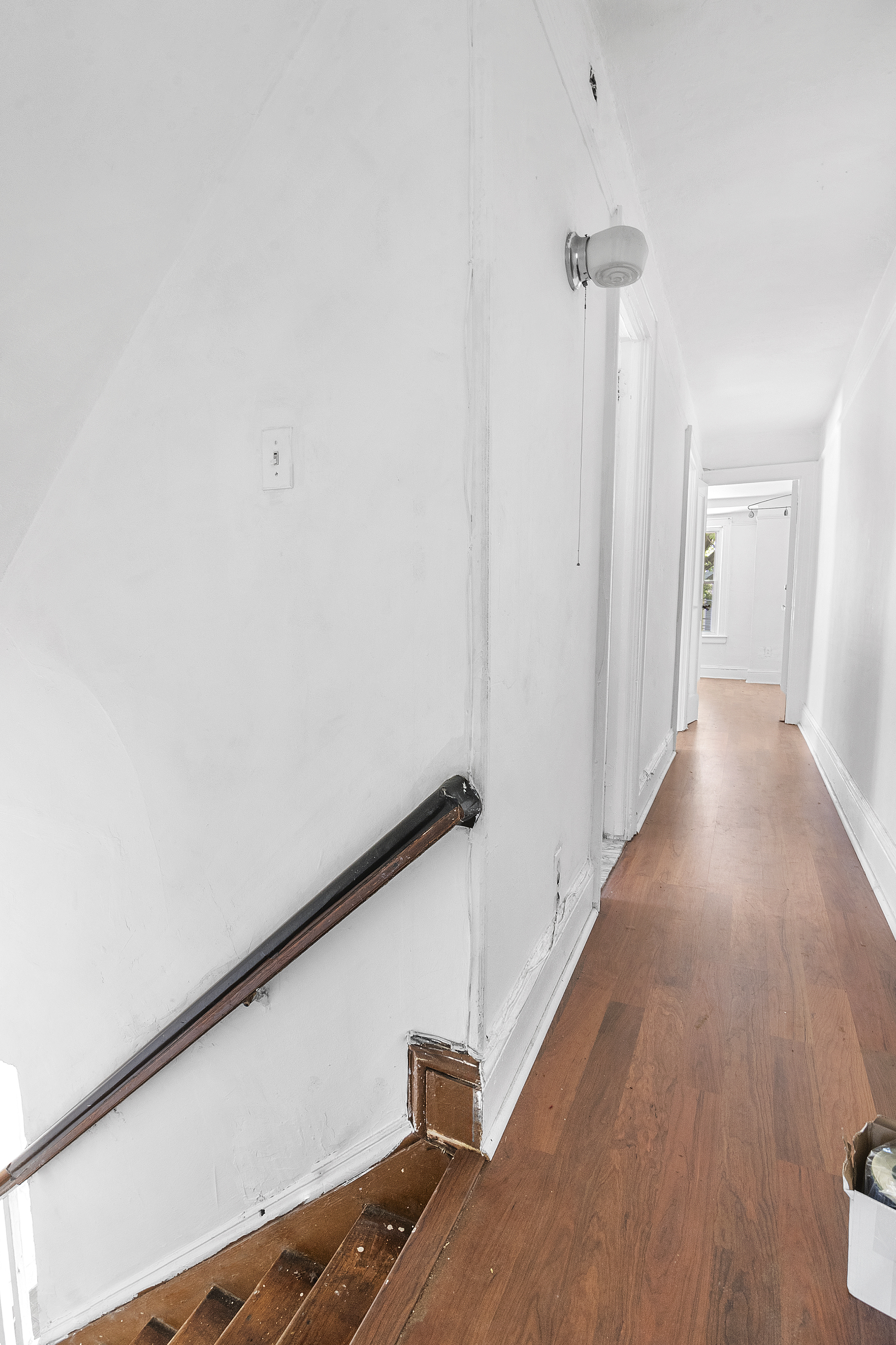266 East 43rd Street Brooklyn, NY 11203 - Photo 3 of 11 a view of a hallway with wooden floor