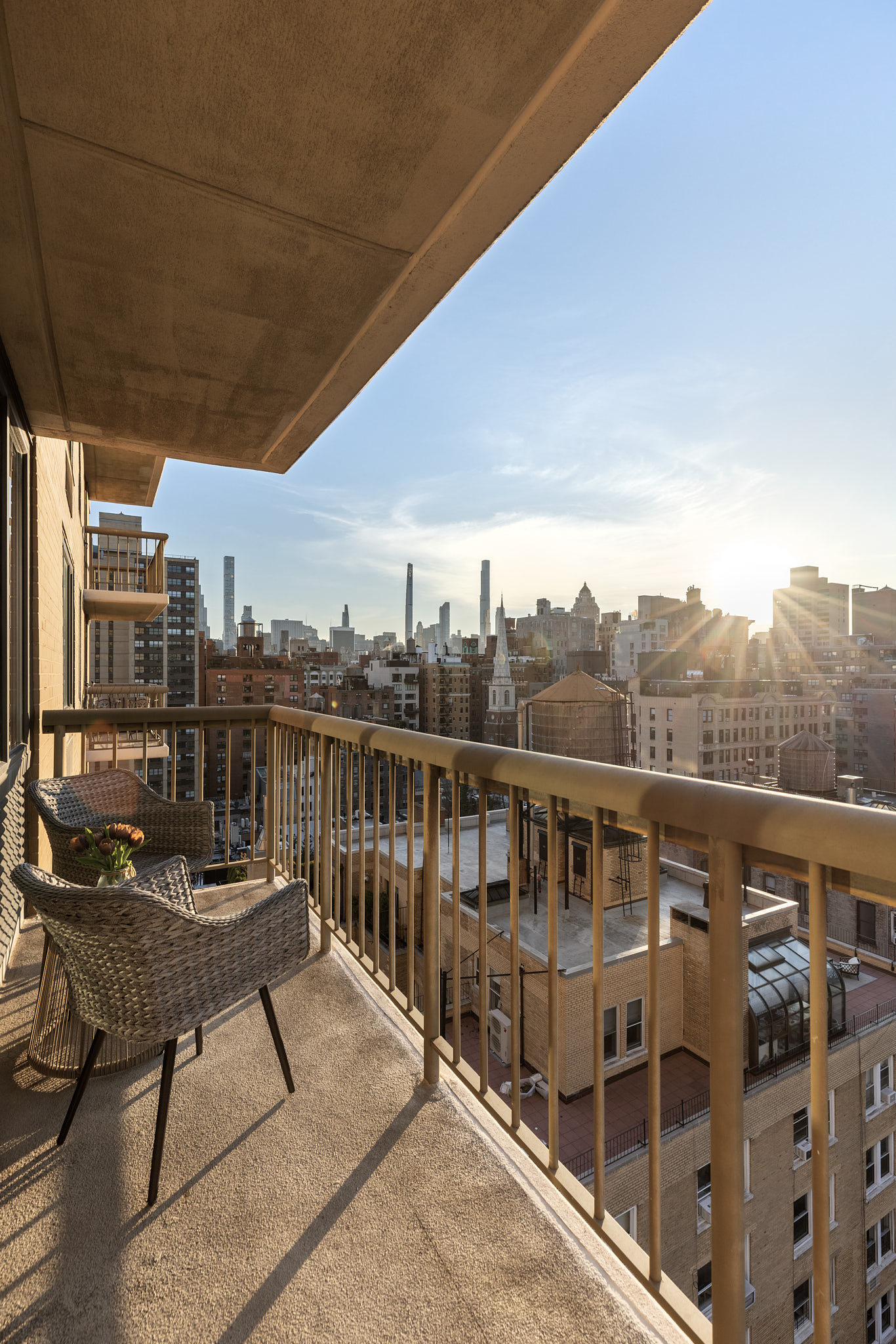 1438 3rd Avenue, Unit 15B Manhattan, NY 10028 - Photo 5 of 21 a view of a balcony with chairs