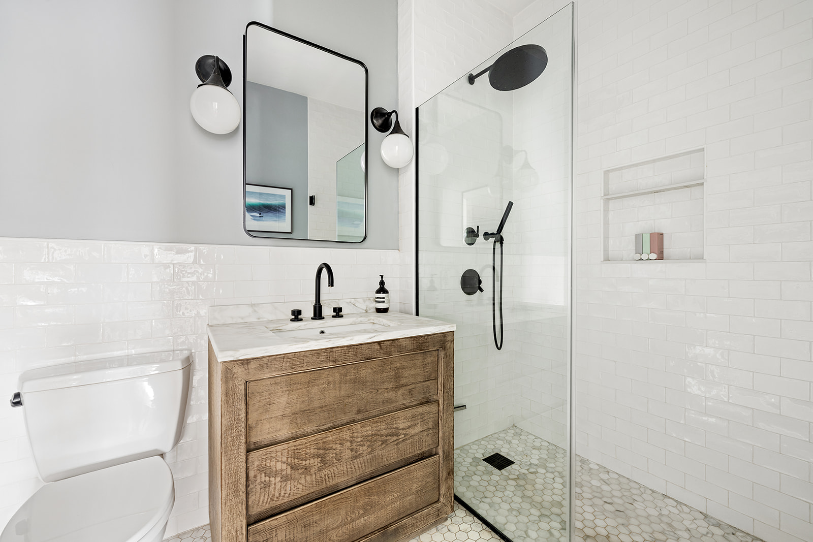 331 A Stuyvesant Avenue Brooklyn, NY 11233 - Photo 17 of 21 a bathroom with a shower sink and mirror