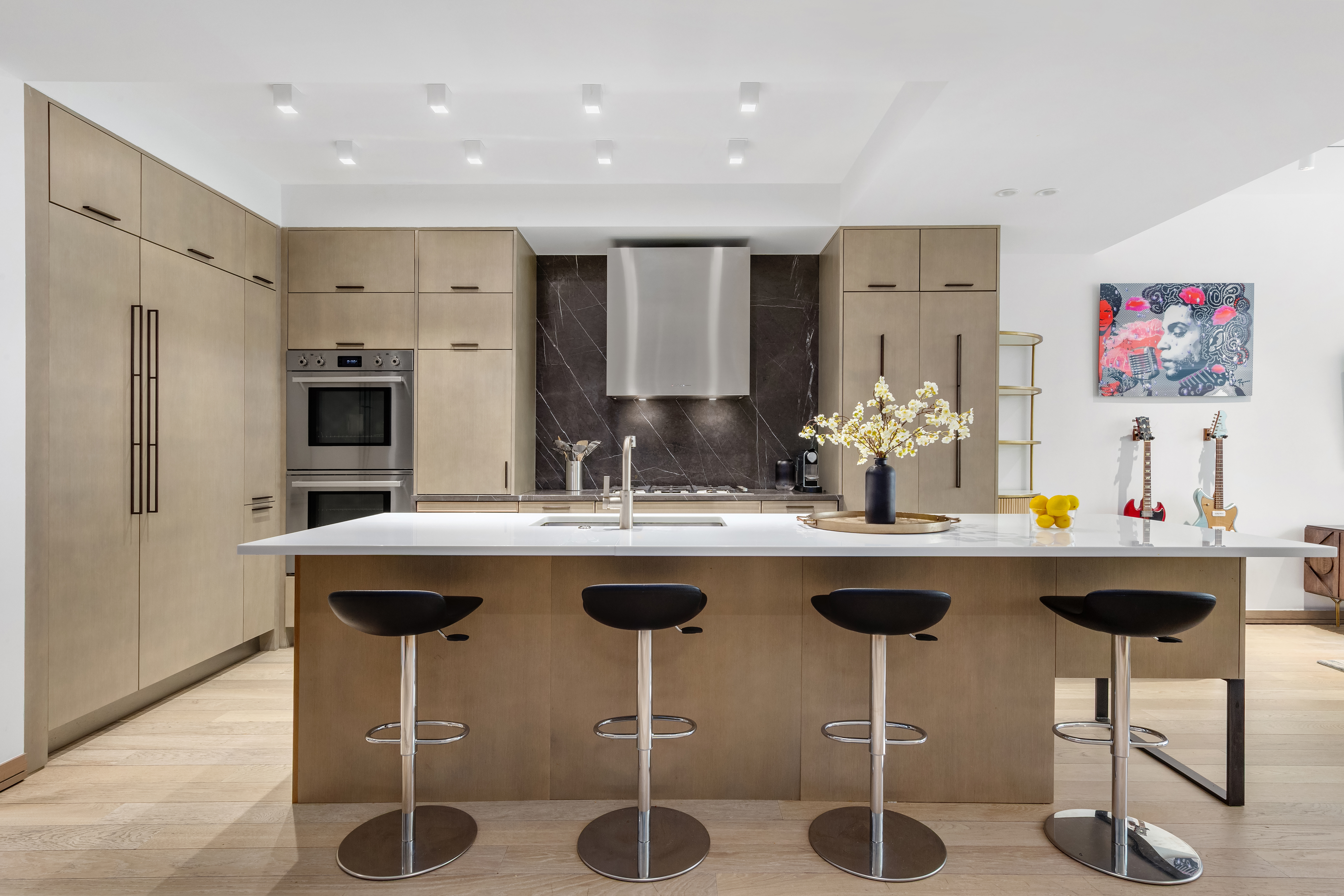 90 Lexington Avenue, Unit MC Manhattan, NY 10016 - Photo 2 of 26 a kitchen with a sink and chairs