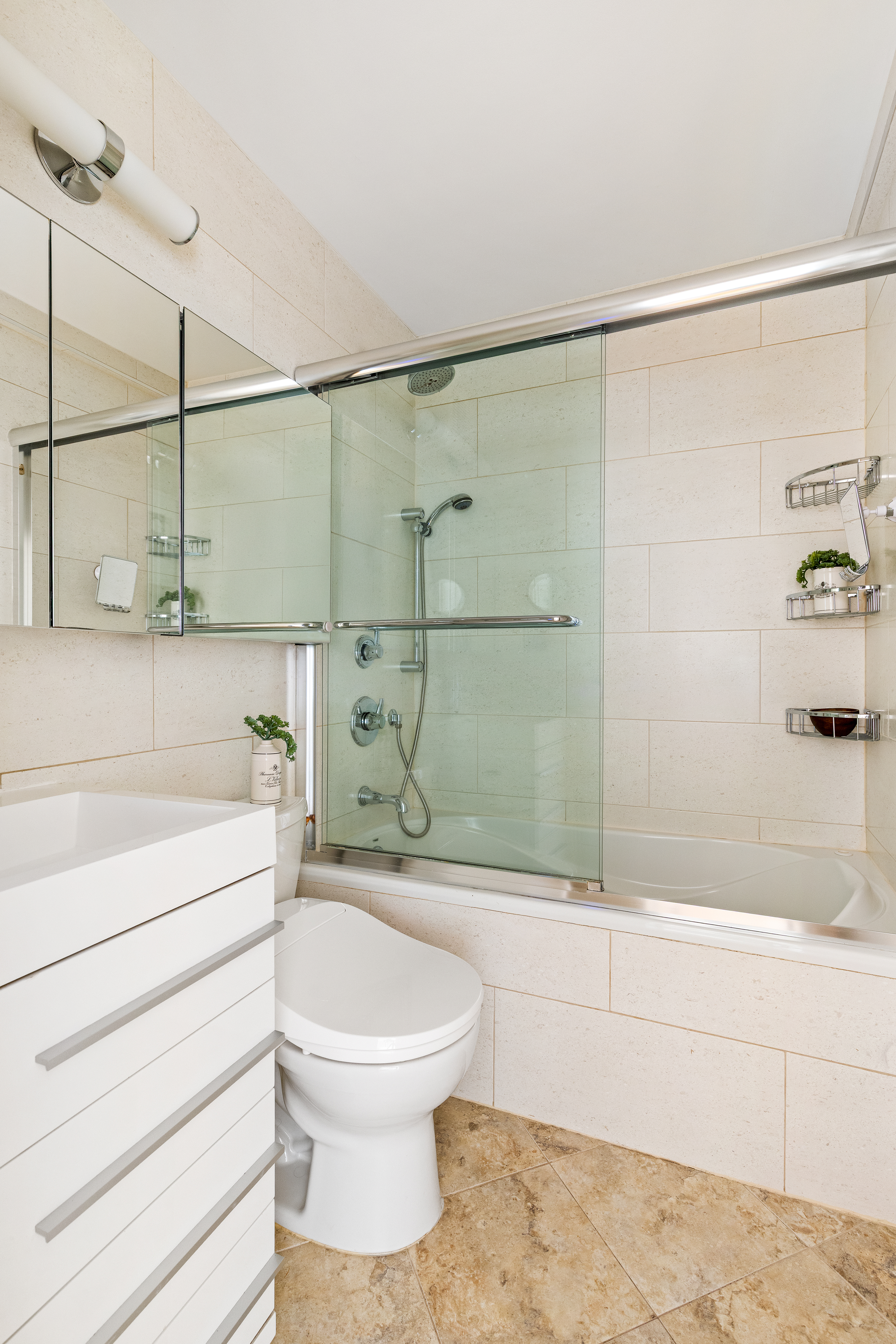 1139 Prospect Avenue, Unit 4G Brooklyn, NY 11218 - Photo 6 of 11 a bathroom with a toilet and shower