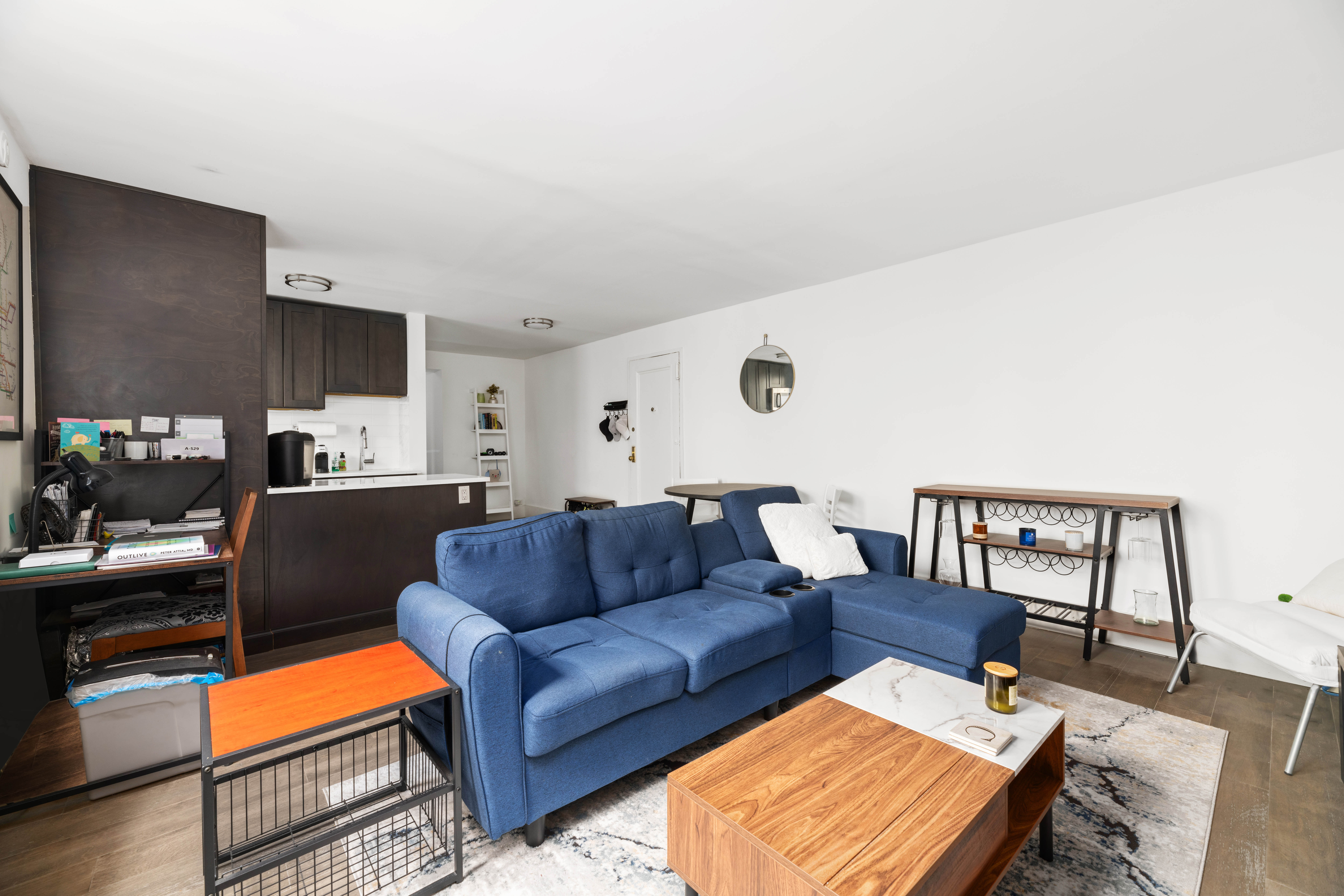 2420 Morris Avenue, Unit 1I Bronx, NY 10468 - Photo 3 of 7 a living room with furniture and a flat screen tv