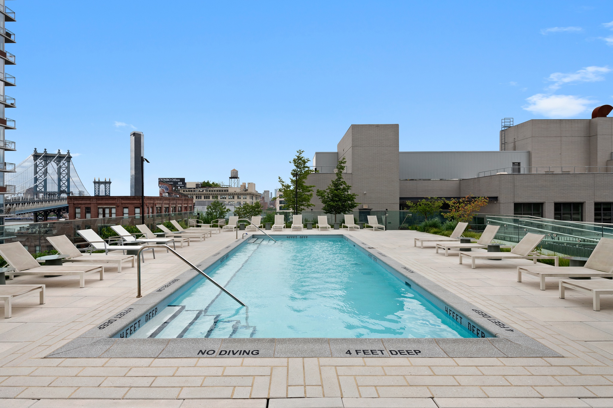160 Front Street, Unit 706 Brooklyn, NY 11201 - Photo 15 of 17 a view of a swimming pool with outdoor seating and city view