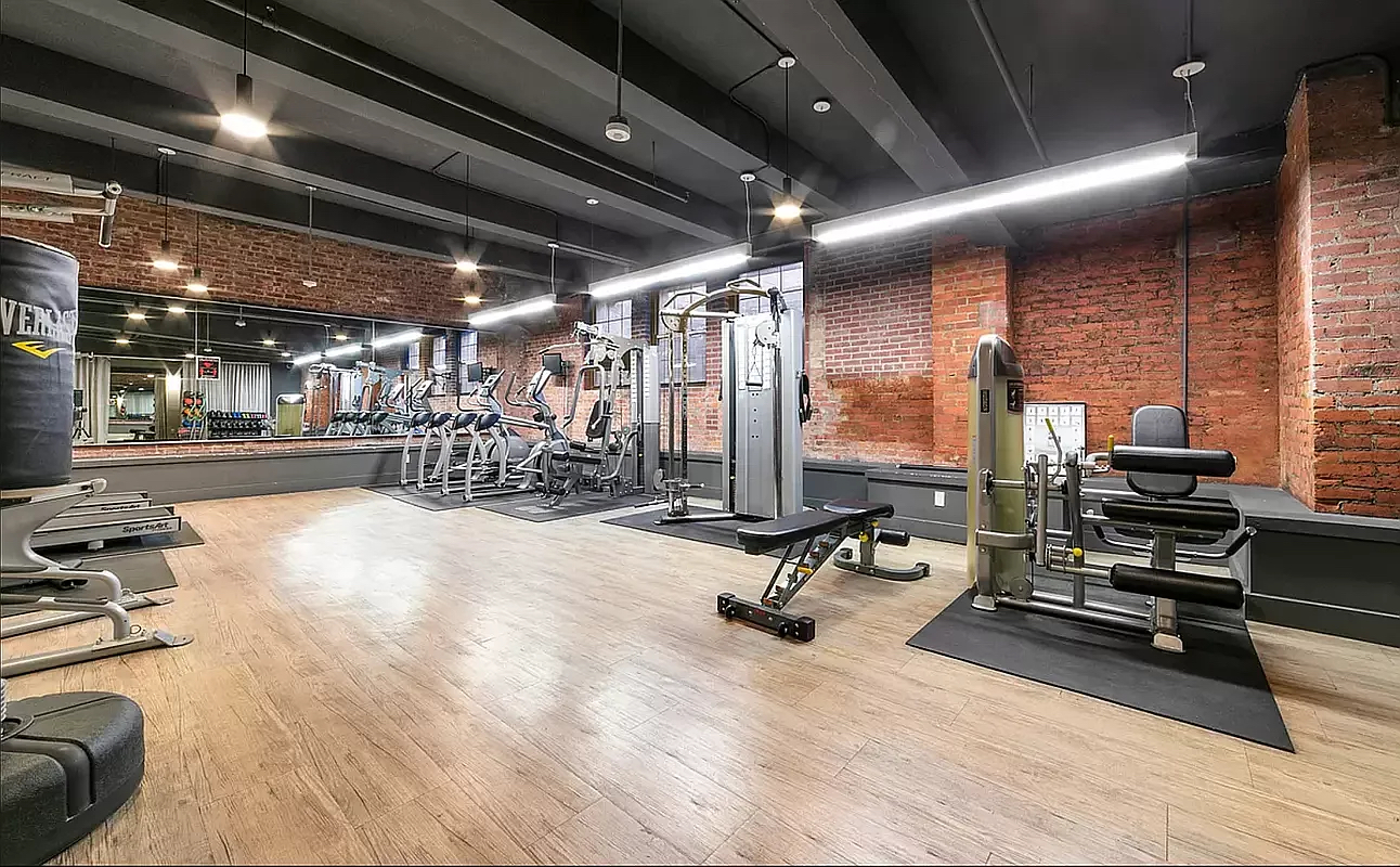 180 Bainbridge Street, Unit 112 Brooklyn, NY 11233 - Photo 12 of 30 a view of a room with gym equipment