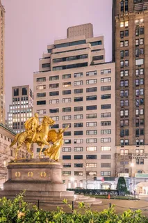 a front view of a building with glass windows