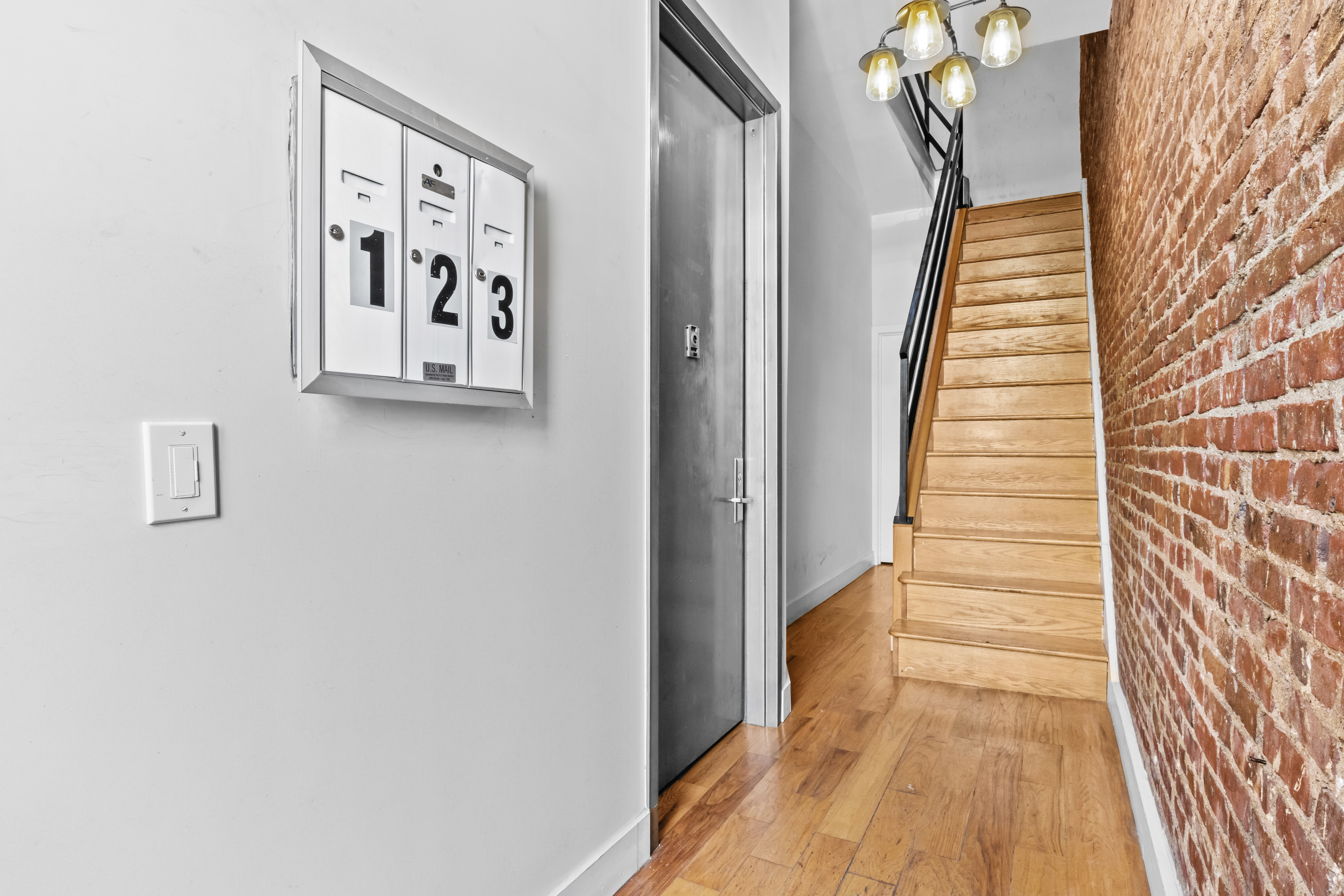 1273 Rogers Avenue, Unit MULTIFAM Brooklyn, NY 11226 - Photo 6 of 13 a view of a hallway with stairs