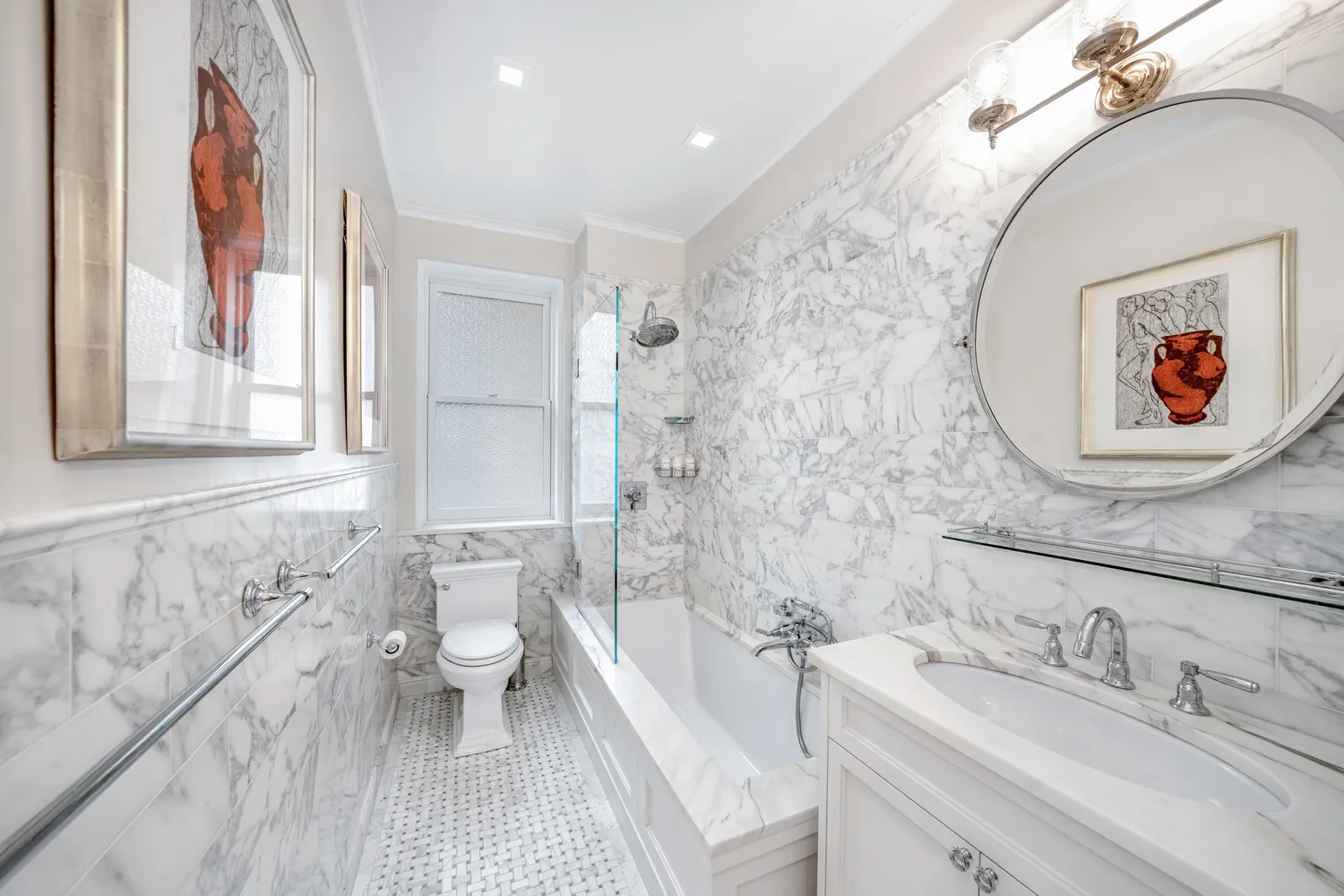 a bathroom with a sink a toilet and a bathtub