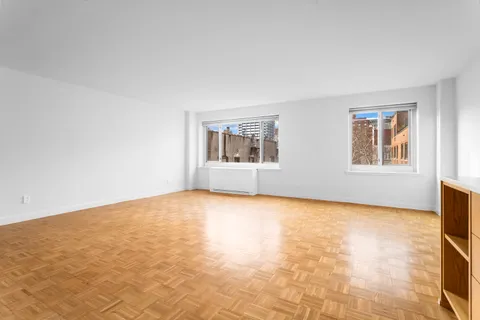 an empty room with windows