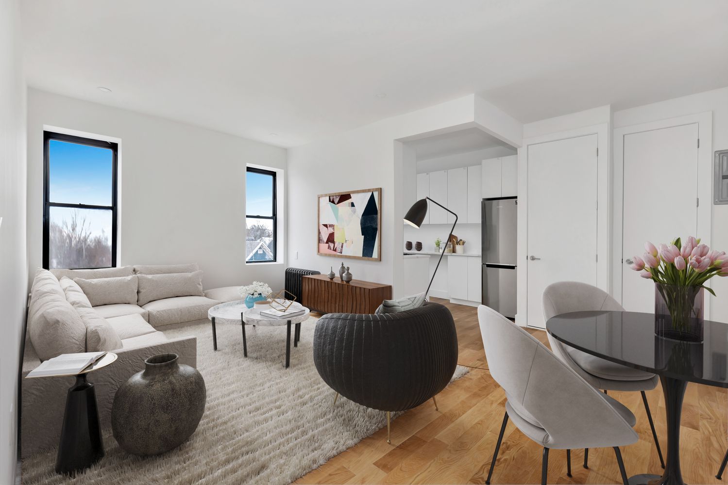 640 Ditmas Avenue, Unit 2 Brooklyn, NY 11218 - Photo 1 of 8 a living room with furniture and a potted plant